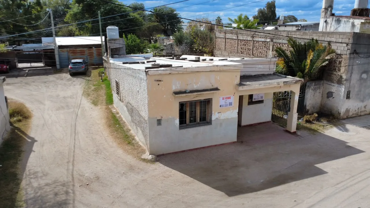 LOTE CON CONTRUCCION — foto 2